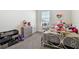 Cozy bedroom with a comfortable bed and storage at 38296 Sonnet Landing Ave, Zephyrhills, FL 33540