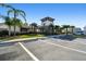 Community center with parking and palm trees at 38296 Sonnet Landing Ave, Zephyrhills, FL 33540