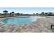 Relaxing community pool with spacious deck at 38296 Sonnet Landing Ave, Zephyrhills, FL 33540