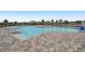 Relaxing community pool with spacious deck at 38296 Sonnet Landing Ave, Zephyrhills, FL 33540