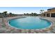 Relaxing community pool with spacious deck at 38296 Sonnet Landing Ave, Zephyrhills, FL 33540