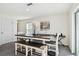 Casual dining area with table, bench, and keyboard at 38296 Sonnet Landing Ave, Zephyrhills, FL 33540