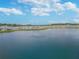 Serene lake view with fountain at 38296 Sonnet Landing Ave, Zephyrhills, FL 33540