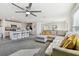Open concept living room, kitchen, and island at 38296 Sonnet Landing Ave, Zephyrhills, FL 33540
