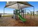 Modern playground with green slide at 38296 Sonnet Landing Ave, Zephyrhills, FL 33540