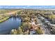Aerial view of a residential neighborhood near the water at 415 Country Club Dr, Oldsmar, FL 34677