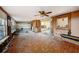 Unfinished sunroom with tile floor, awaiting renovation at 415 Country Club Dr, Oldsmar, FL 34677