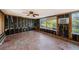 Unfinished sunroom with exposed walls and floor at 415 Country Club Dr, Oldsmar, FL 34677
