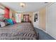 Spacious bedroom with king-size bed and walk-in closet at 5147 Perennial Dr, Holiday, FL 34690