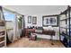 Home office with large window, desk, and shelving at 5147 Perennial Dr, Holiday, FL 34690