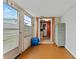 Enclosed sunroom leading to the kitchen at 5147 Perennial Dr, Holiday, FL 34690