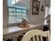 Coastal-themed dining room with built-in storage at 5215 Coquina Key Se Dr # A, St Petersburg, FL 33705