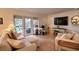 Bright living room with water views and comfortable seating at 5215 Coquina Key Se Dr # A, St Petersburg, FL 33705