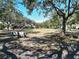 Park-like setting with a bench in a residential community at 5320 Golden Isles Dr, Apollo Beach, FL 33572