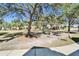 Community green space with trees and sandhill cranes at 5320 Golden Isles Dr, Apollo Beach, FL 33572