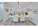 Bright and airy dining room with a large table at 5320 Golden Isles Dr, Apollo Beach, FL 33572