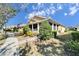 View of the side of the house with lush landscaping at 5320 Golden Isles Dr, Apollo Beach, FL 33572