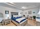 Spacious main bedroom with a comfortable bed and plenty of natural light at 5320 Golden Isles Dr, Apollo Beach, FL 33572