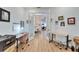 Home office with two work stations and view to living area at 5320 Golden Isles Dr, Apollo Beach, FL 33572