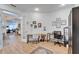 Bright home office with wood floors and view of living room at 5320 Golden Isles Dr, Apollo Beach, FL 33572