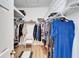 Large walk-in closet with ample shelving and hanging space at 5320 Golden Isles Dr, Apollo Beach, FL 33572