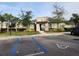 Community pool entrance with parking and access for residents at 5508 Viola Lee Way, Lutz, FL 33558