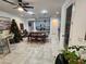 Kitchen and dining area with modern decor and tile flooring at 5508 Viola Lee Way, Lutz, FL 33558