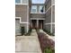 Townhome entrance with double doors and walkway at 5508 Viola Lee Way, Lutz, FL 33558