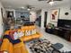 Open concept living room featuring a sectional sofa at 5508 Viola Lee Way, Lutz, FL 33558