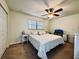 Spacious bedroom with a king-size bed, ceiling fan, and ample natural light at 6100 Gulfport S Blvd # 214, Gulfport, FL 33707