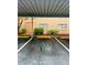 Reserved parking spaces under covered carport at 6100 Gulfport S Blvd # 214, Gulfport, FL 33707