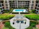 Relaxing patio with pergola, seating, and lush landscaping at 6100 Gulfport S Blvd # 214, Gulfport, FL 33707