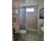 Bathroom with shower stall, toilet and vanity at 6580 Seminole Blvd # 618, Seminole, FL 33772