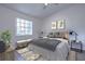 Main bedroom with plush bed and modern decor at 6781 121St Ave # F, Largo, FL 33773