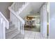 Clean and bright staircase leading to the upper level of the home at 6781 121St Ave # F, Largo, FL 33773