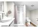 Clean bathroom with shower, toilet and modern vanity at 724 Bayshore Dr, Terra Ceia, FL 34250