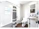 Modern bathroom with a tub, shower, and updated vanity at 724 Bayshore Dr, Terra Ceia, FL 34250