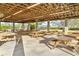 Large covered pavilion with picnic tables, perfect for outdoor gatherings at 724 Bayshore Dr, Terra Ceia, FL 34250