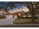 Charming home with a well-manicured lawn and inviting curb appeal at 8701 Ballantrae Way, Tampa, FL 33647