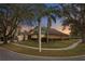 Well-maintained home with professional landscaping and a corner lot at 8701 Ballantrae Way, Tampa, FL 33647