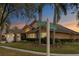 Beautiful single story home with mature trees, manicured lawns and sidewalk at 8701 Ballantrae Way, Tampa, FL 33647