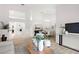 Bright, open living space showcasing modern furnishings, neutral décor, and seamless flow at 8701 Ballantrae Way, Tampa, FL 33647