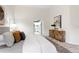 Serene bedroom with soft tones and seamless access to the en-suite bathroom at 8701 Ballantrae Way, Tampa, FL 33647