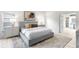 Stylishly furnished bedroom featuring large windows and a comfortable bed at 8701 Ballantrae Way, Tampa, FL 33647