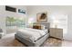 Bright bedroom with ample natural light and view of outdoor pool area at 8701 Ballantrae Way, Tampa, FL 33647
