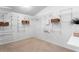 Spacious walk-in closet with ample shelving and organized storage solutions at 8701 Ballantrae Way, Tampa, FL 33647