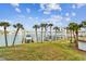 Scenic waterfront view with lush landscaping at 9825 Harrell Ave # 202, Treasure Island, FL 33706