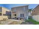 Private backyard with patio and AC unit at 15521 Long Cypress Dr, Ruskin, FL 33573