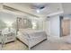 Main bedroom with king-size bed and double dresser at 15521 Long Cypress Dr, Ruskin, FL 33573