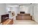 Spacious loft area with couch and ceiling fan at 15521 Long Cypress Dr, Ruskin, FL 33573